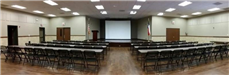 Panoramic view of Community Center stage and chairs