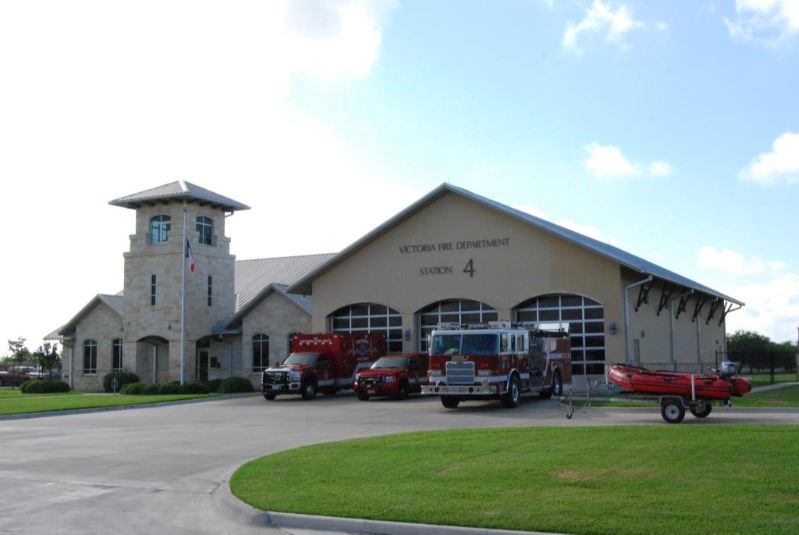 Victoria Fire Department Station 4 with three emergency services vehicles parked outside