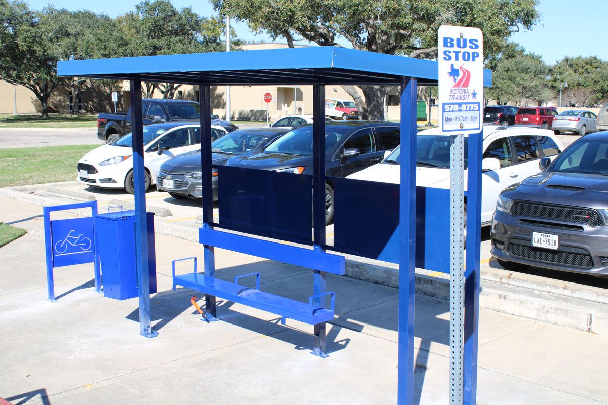 A blue Victoria Transit shelter at Victoria College