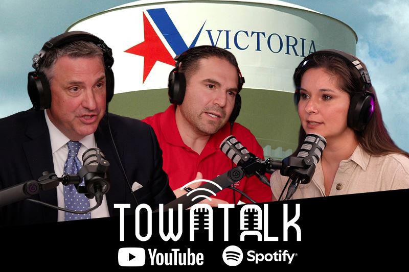 Mayor, City Manager and Ashley talking with water tower in the background