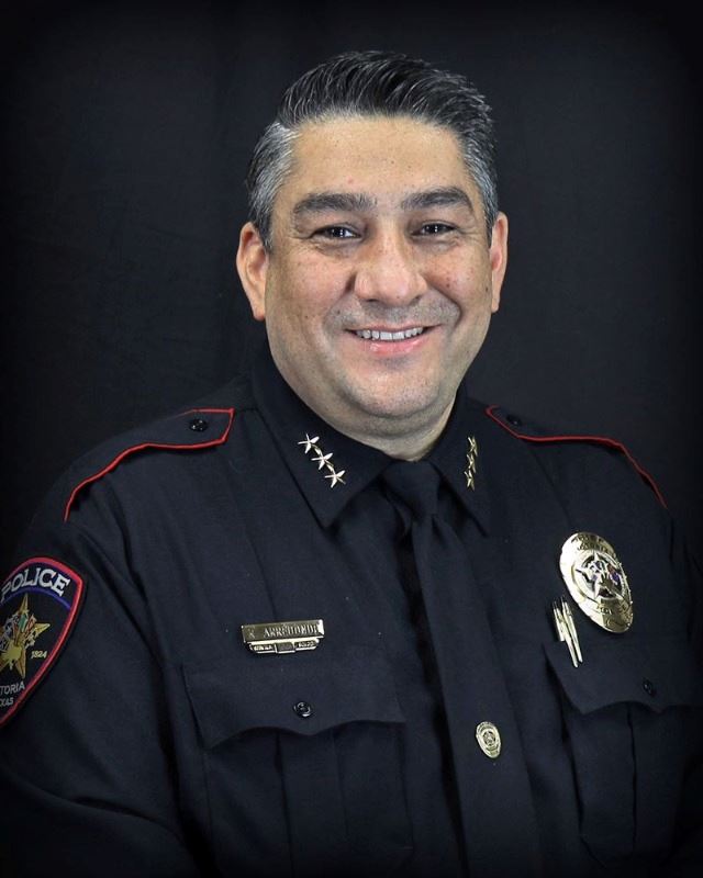 Roberto Arredondo Jr. in police uniform