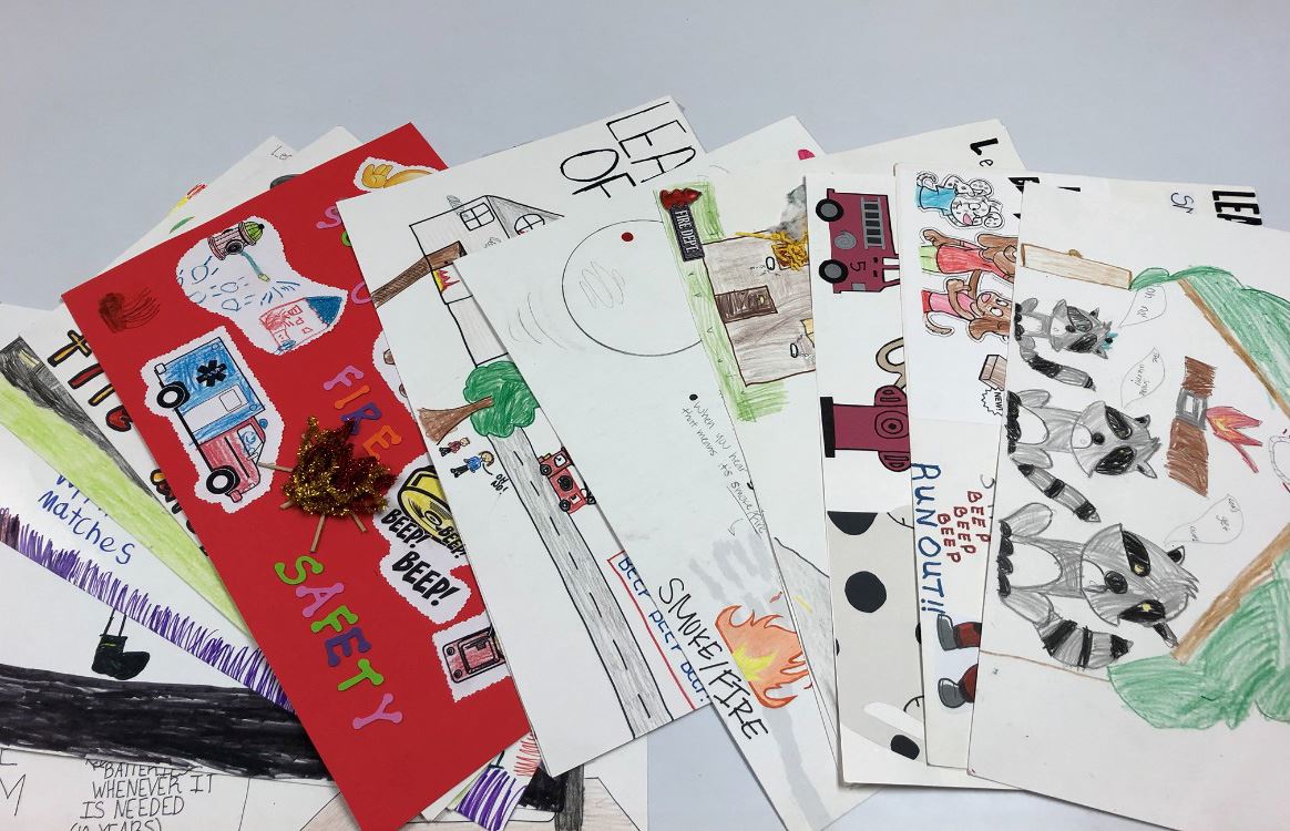 Fire prevention themed posters made by children