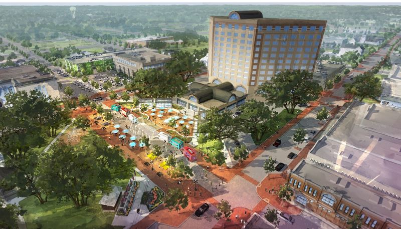 DeLeon Plaza and One O'Connor. The street between them is a walkway with food trucks and tables.