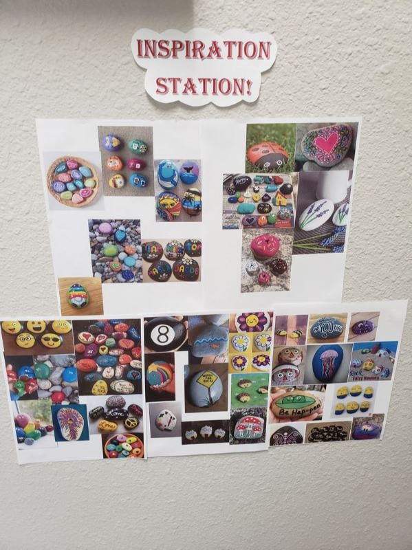 A collage of rocks painted to look like animals, objects, emojis and characters.