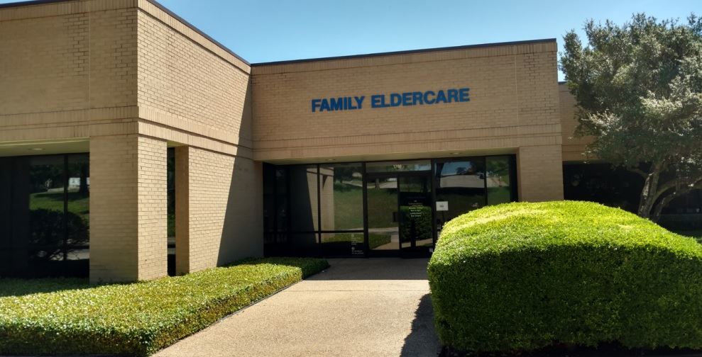 Beige brick building. Sign reads Family Eldercare.